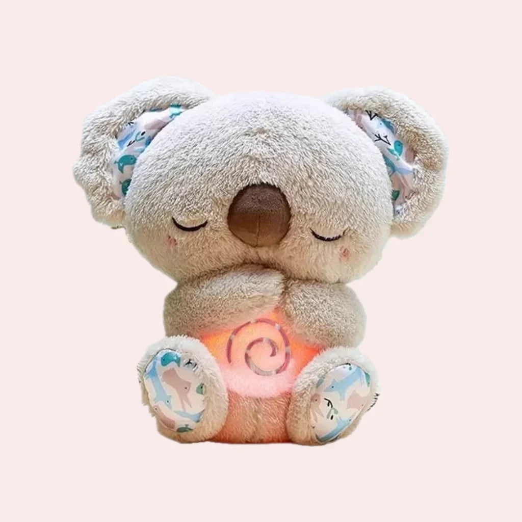 Gray breathing koala plush with brown nose, patterned ears, and illuminated spiral belly