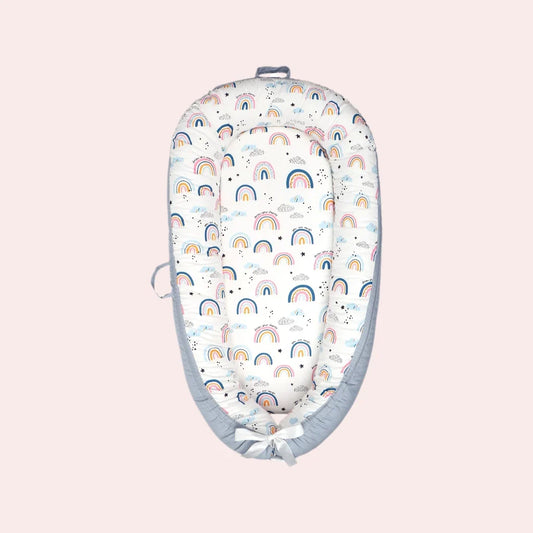 Cotton baby lounger nest for newborns with rainbow pattern