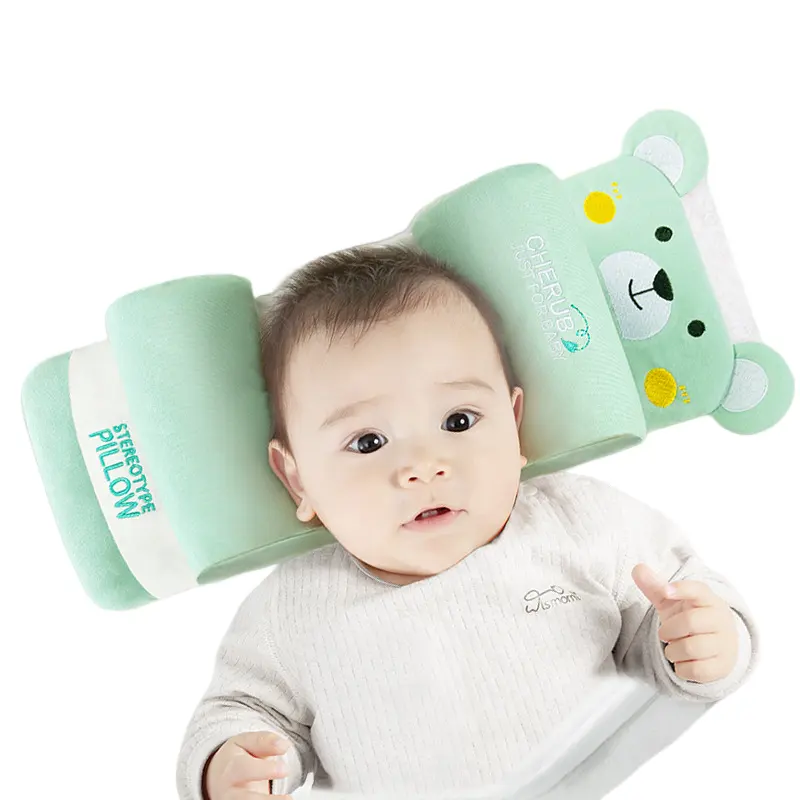 Light green bear side-roll baby pillow with two padded rolls and a mesh center panel