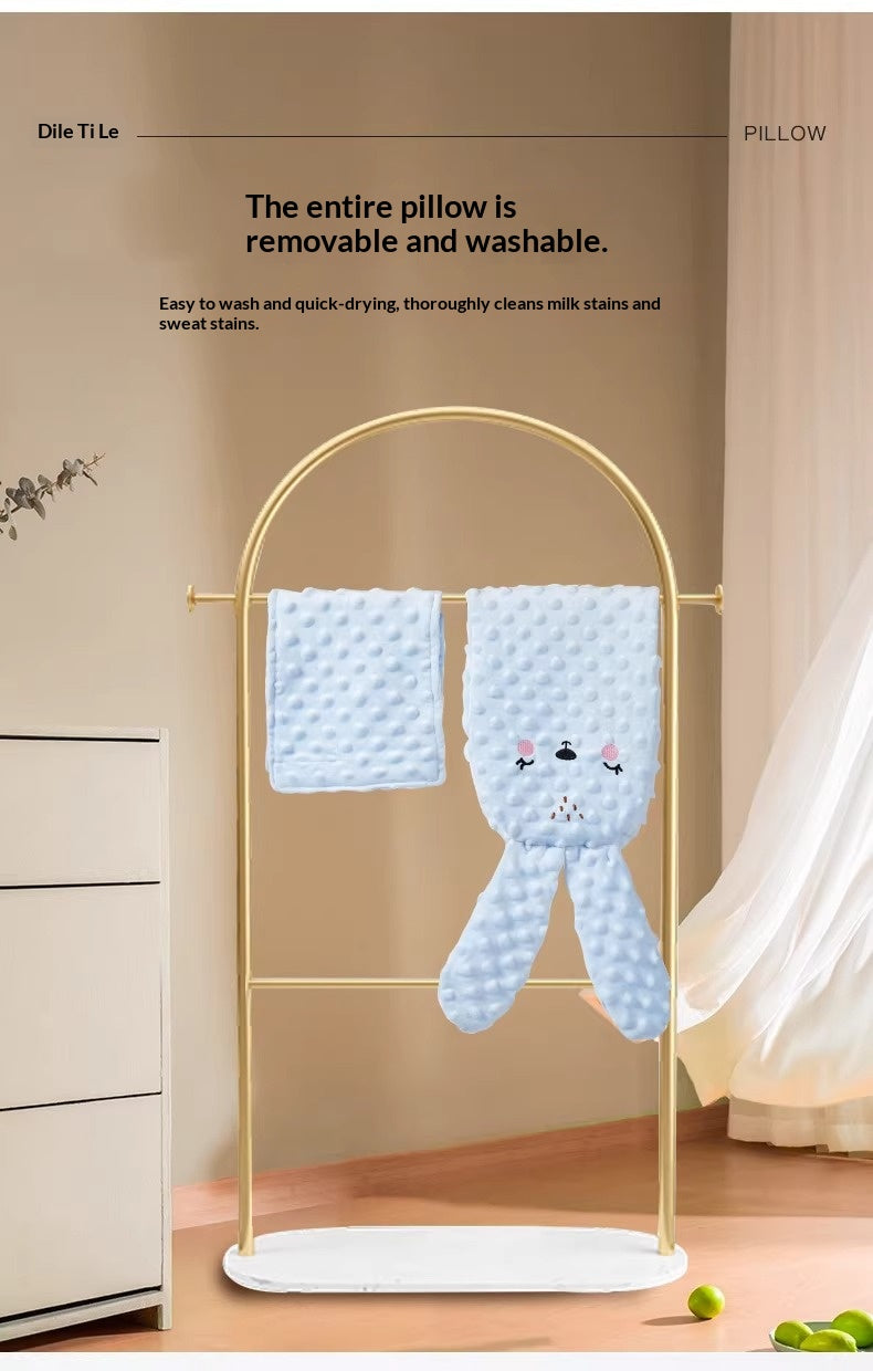 Close up of breathable velvet fabric on infant soothing bolster