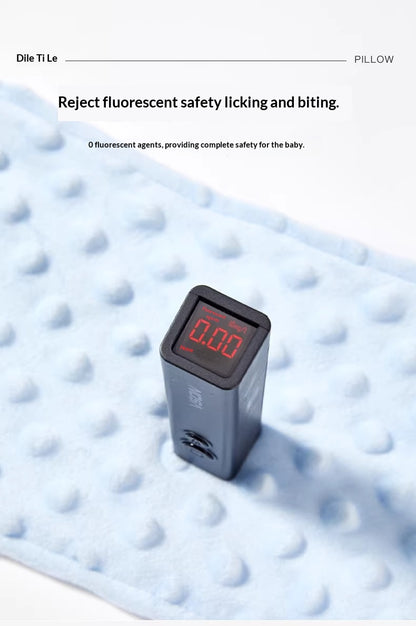 Close up of breathable velvet fabric on infant soothing bolster