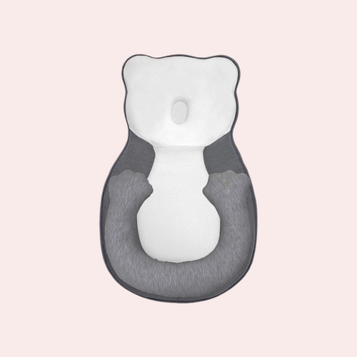 Newborn head shaping pillow in gray and white with leg support