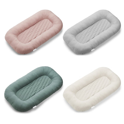Color options for soft striped infant lounger bed
