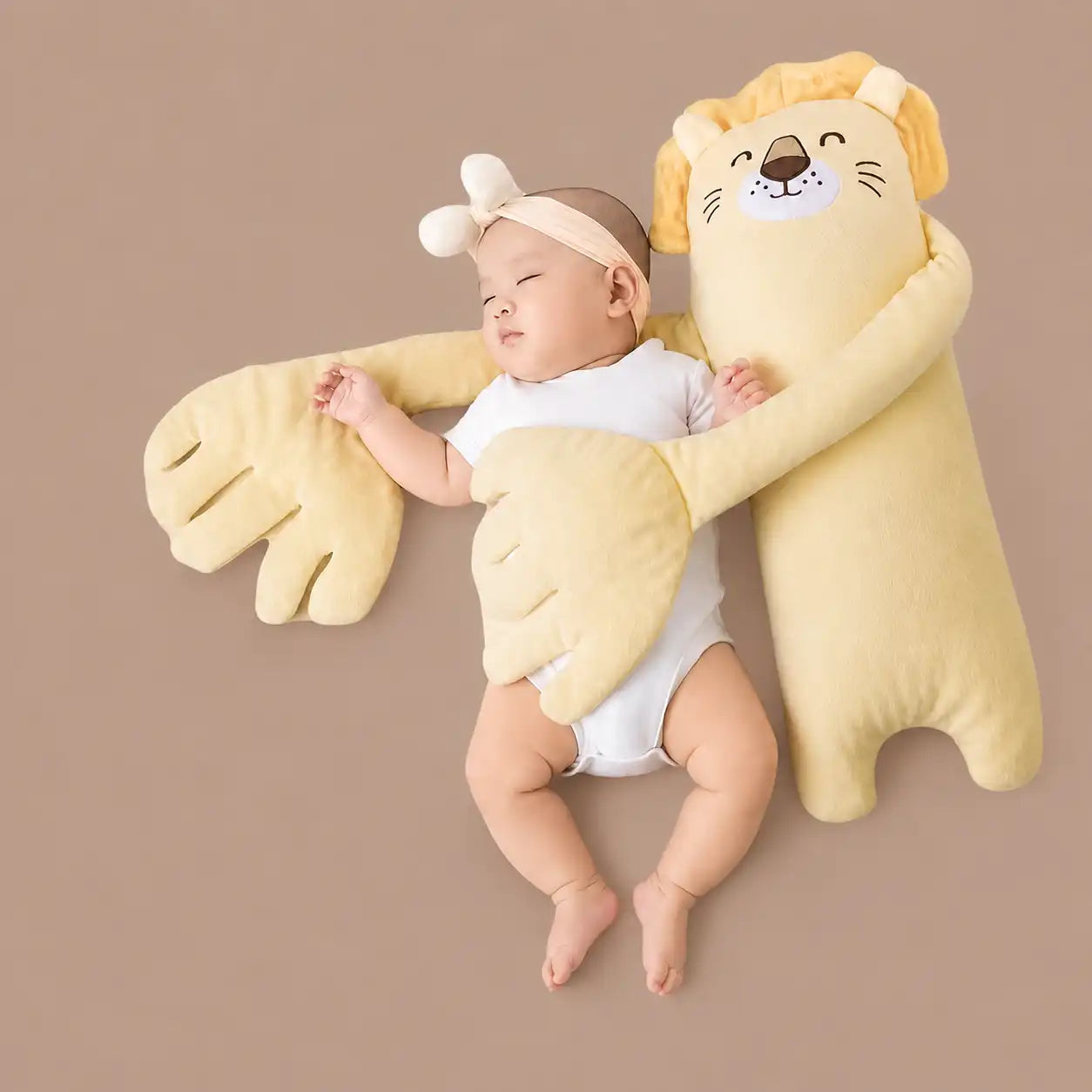 Yellow lion baby soothing sleep companion hugging newborn