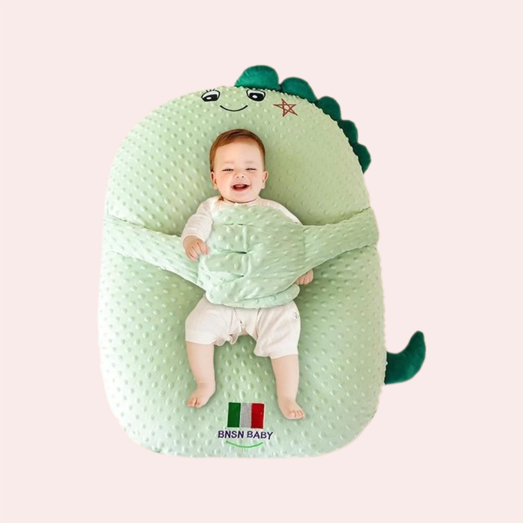 Anti reflux baby lounger in Dino Green with gentle patting function