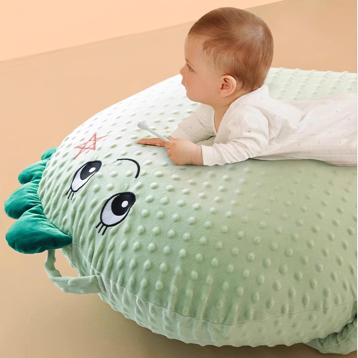 Infant relaxing comfortably on anti reflux baby lounger