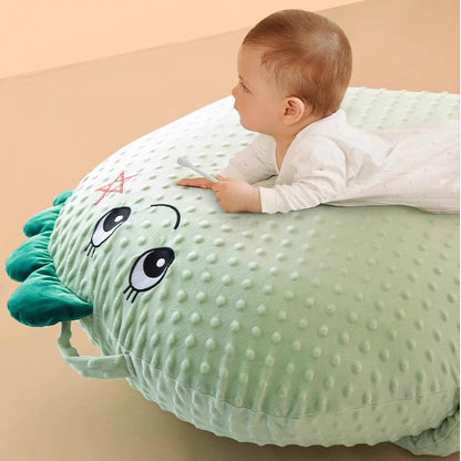 Infant relaxing comfortably on anti reflux baby lounger