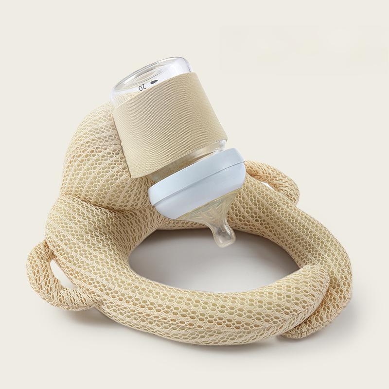 Beige self feeding nursing pillow