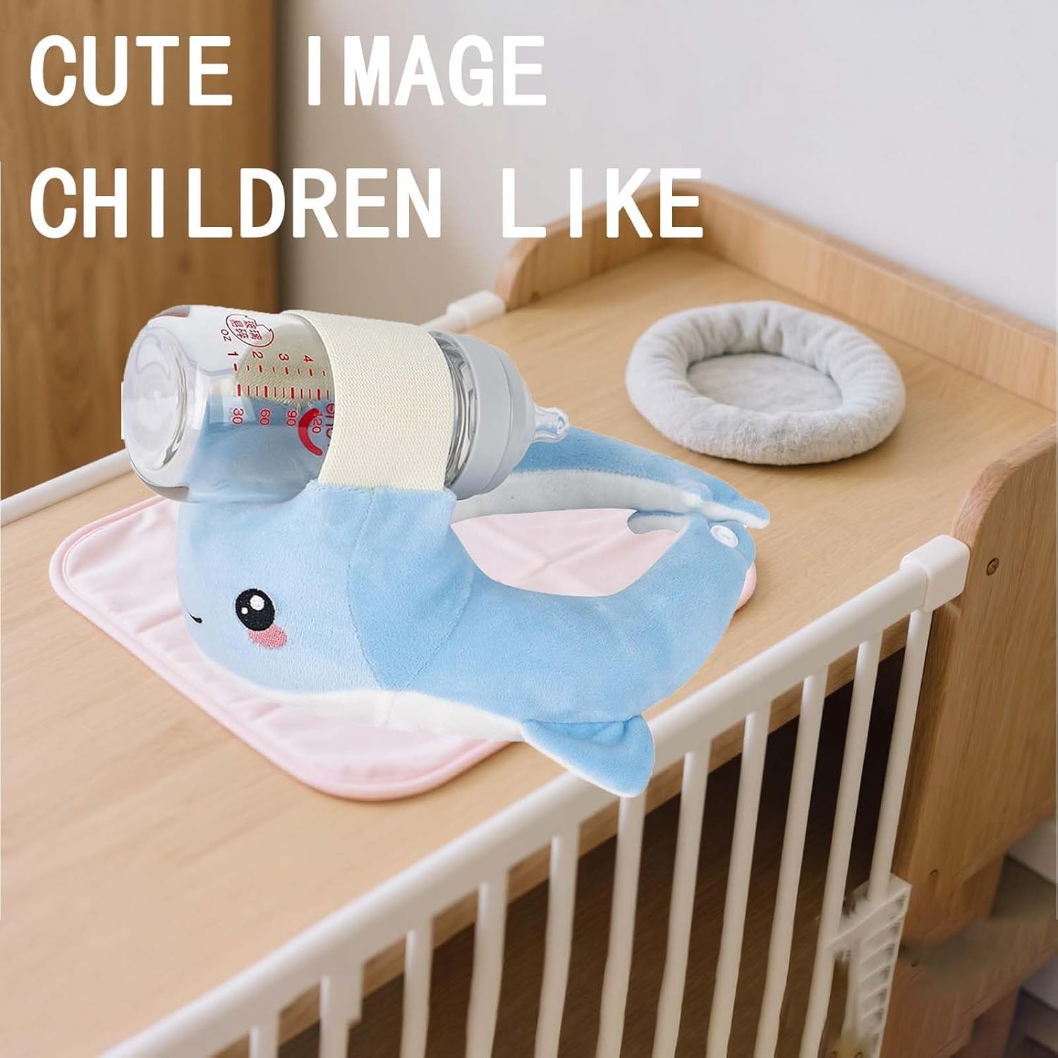Cute whale nursery decoration in crib
