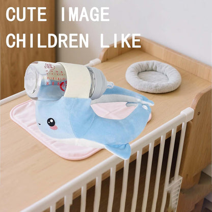 Cute whale nursery decoration in crib