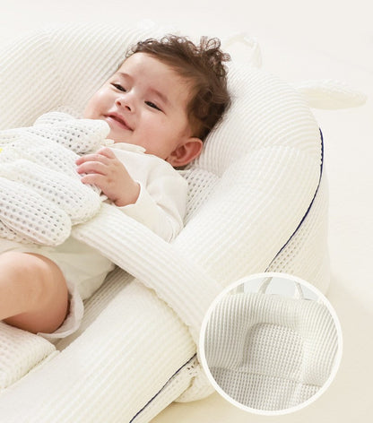 Ergonomic infant lounger with anti slip hip support pillars