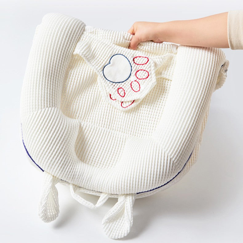 Ergonomic infant lounger with anti slip hip support pillars
