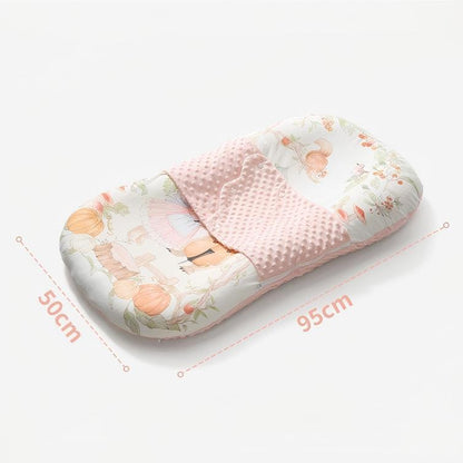 Reversible baby nest lounger with warm dotted minky fabric
