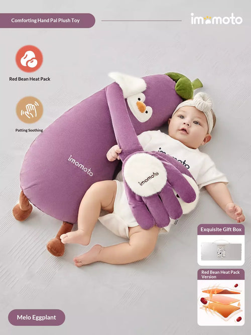 Infant using Imomoto electric patting eggplant toy for sleep soothing with constant heat feature