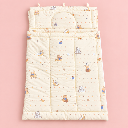 Moon bear newborn sleeping quilt flat lay on pink background