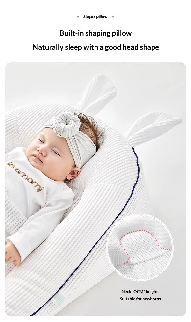 Safe convertible infant bed with non-toxic finish in a modern nursery setting