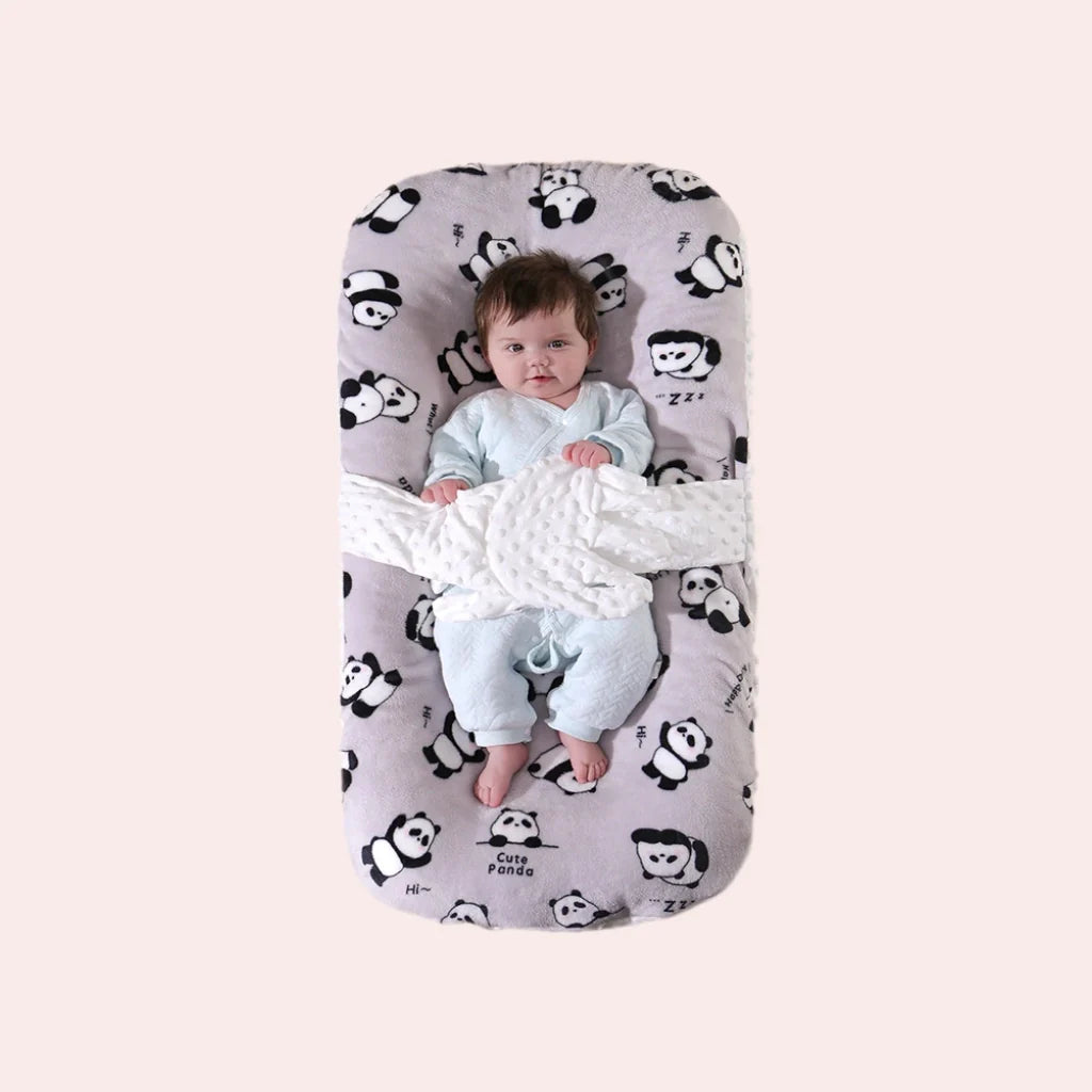 Soothing baby lounger with gentle patting for newborn sleep