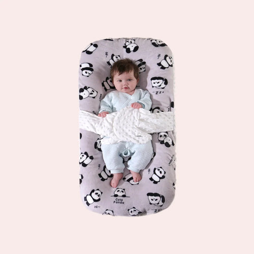 Soothing baby lounger with gentle patting for newborn sleep