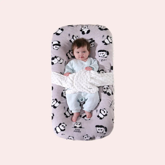 Soothing baby lounger with gentle patting for newborn sleep